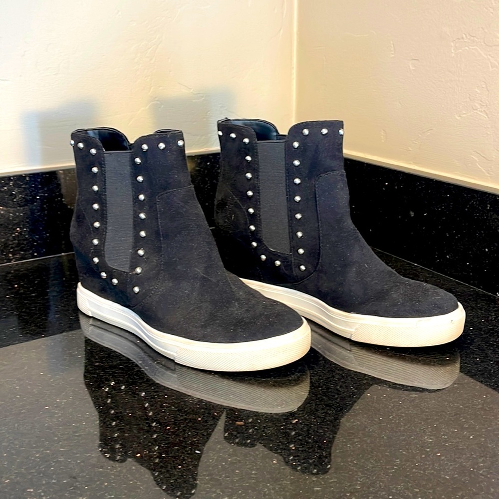 Also black studded healed shoes